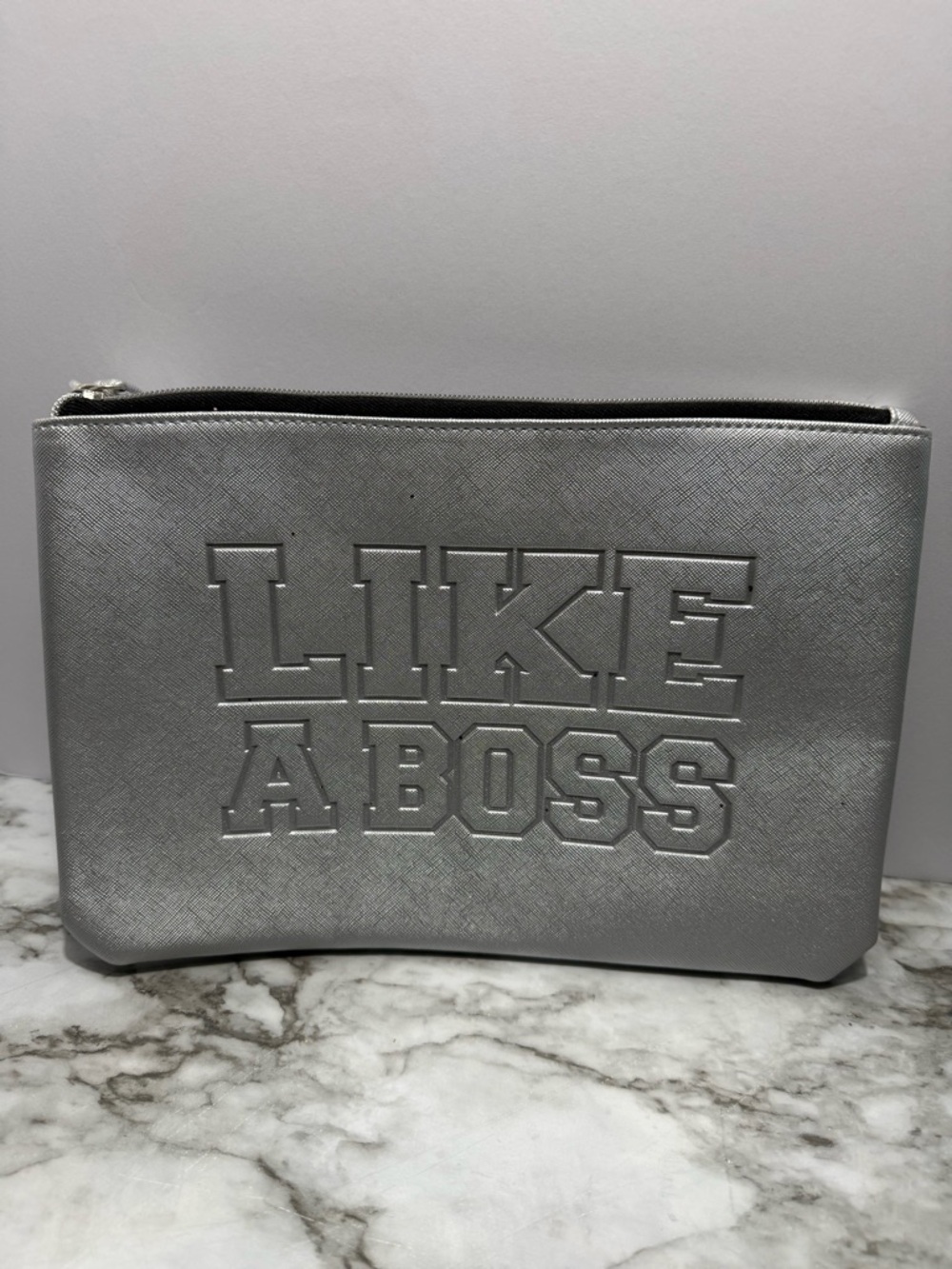 Silver statement clutch